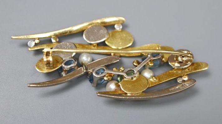 An early 1990s 18ct two colour gold and gem set modernist brooch, 5cm,